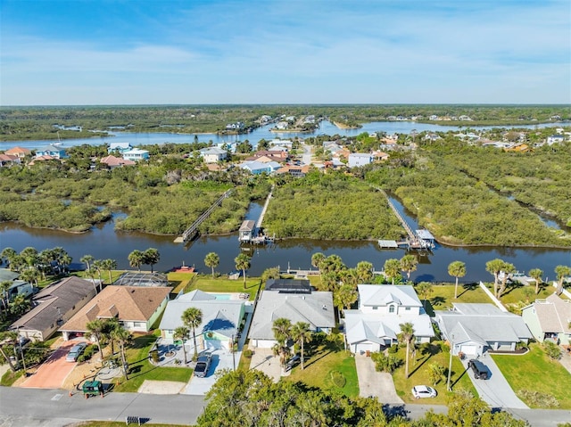 aerial view featuring a residential view and a water view