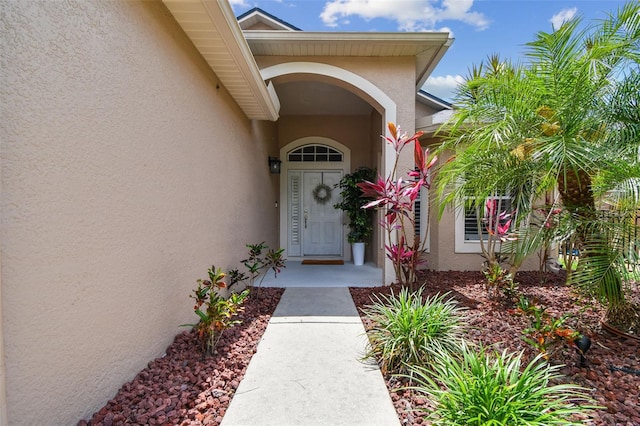 6006 Chellas Ct, Lutz, FL 33558 - property entrance with stucco siding