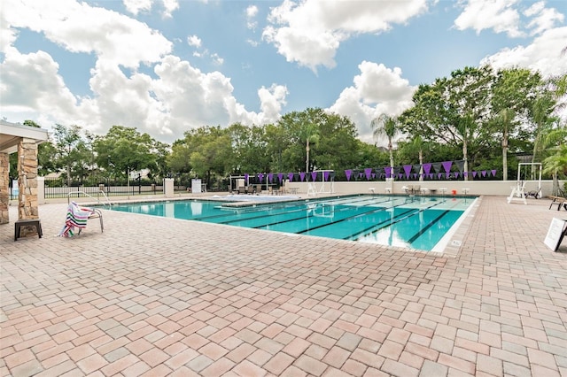 6006 Chellas Ct, Lutz, FL 33558 - community pool featuring a patio and fence