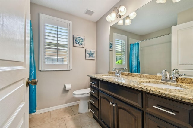 6006 Chellas Ct, Lutz, FL 33558 - bathroom with double vanity, tile patterned floors, and a shower with shower curtain
