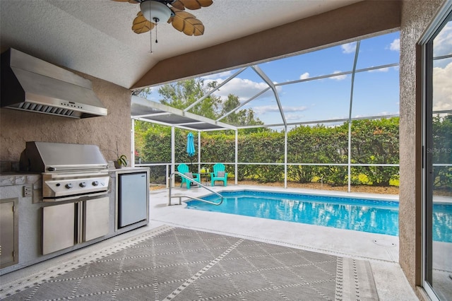 6006 Chellas Ct, Lutz, FL 33558 - swimming pool featuring an outdoor kitchen, a patio, a ceiling fan, and glass enclosure