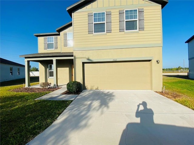 35003 Daisy Meadow Loop, Zephyrhills, FL 33541 - view of front of home with a garage, a front lawn, concrete driveway, board and batten siding, and stucco siding