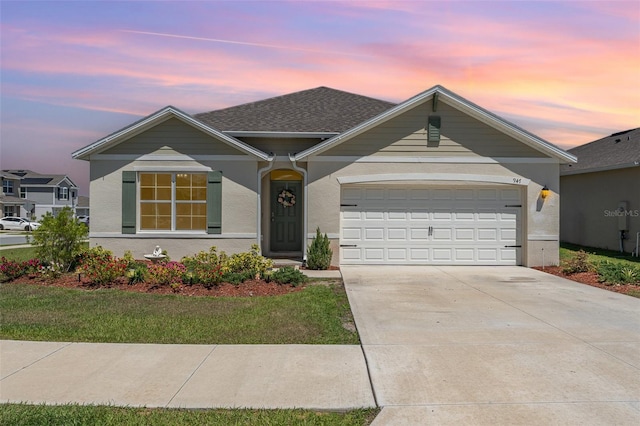 947 Serchio St, Haines City, FL 33844 - ranch-style home featuring an attached garage, stucco siding, a shingled roof, and concrete driveway