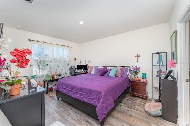 947 Serchio St, Haines City, FL 33844 - bedroom with light wood finished floors