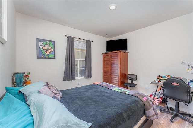947 Serchio St, Haines City, FL 33844 - bedroom featuring wood finished floors