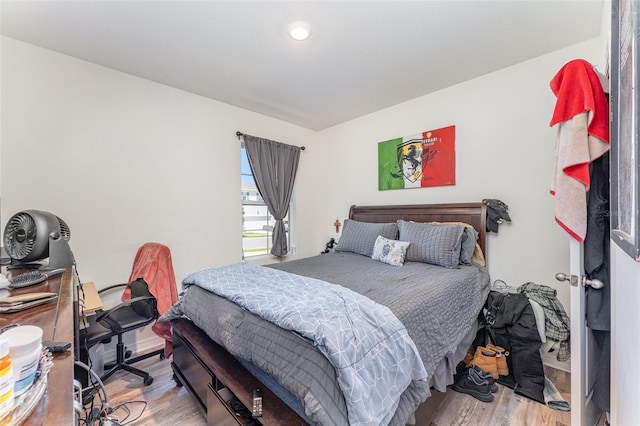 947 Serchio St, Haines City, FL 33844 - bedroom with recessed lighting and wood finished floors