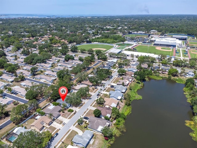 aerial view featuring a water view and a residential view