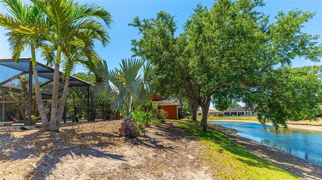 6148 Bonaventure Ct, Sarasota, FL 34243 - view of yard featuring glass enclosure