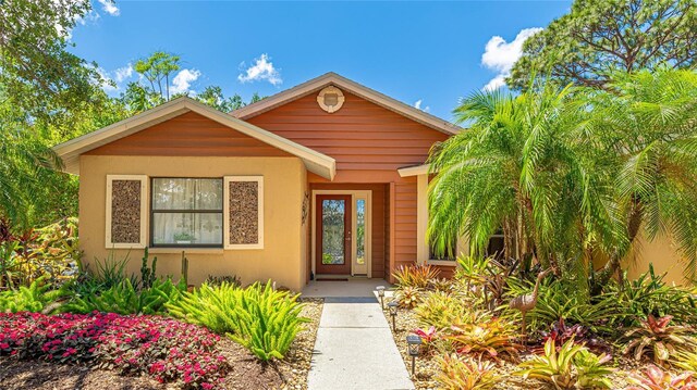 6148 Bonaventure Ct, Sarasota, FL 34243 - view of front of house with stucco siding