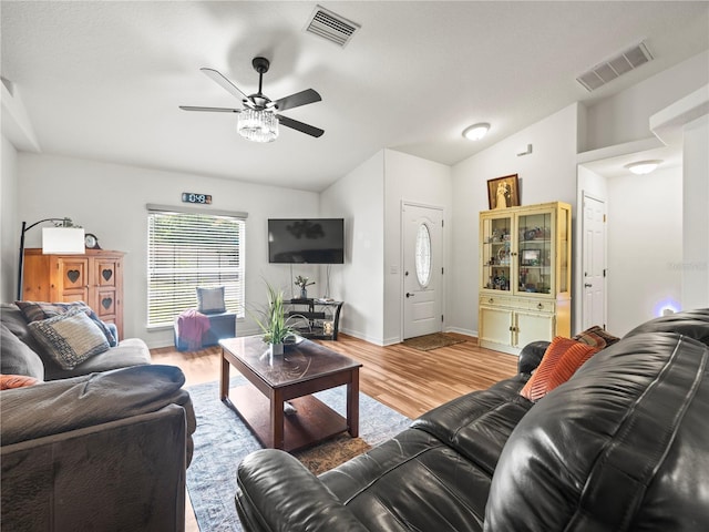 30 N Kaufman Ter, Inverness, FL 34453 - living area with a ceiling fan, visible vents, wood finished floors, and lofted ceiling