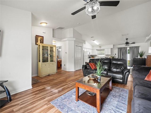 30 N Kaufman Ter, Inverness, FL 34453 - living area with ceiling fan, visible vents, light wood finished floors, and lofted ceiling