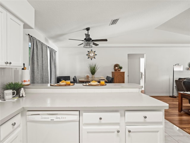 30 N Kaufman Ter, Inverness, FL 34453 - kitchen featuring visible vents, a peninsula, white cabinets, a ceiling fan, and dishwasher