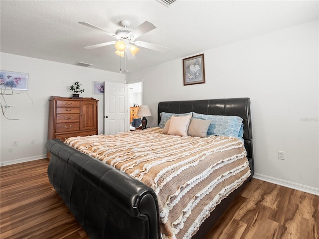 30 N Kaufman Ter, Inverness, FL 34453 - bedroom with ceiling fan, baseboards, visible vents, and wood finished floors