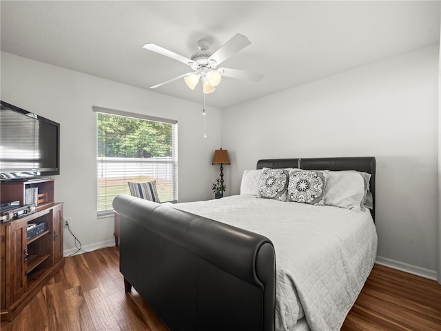 30 N Kaufman Ter, Inverness, FL 34453 - bedroom featuring baseboards, ceiling fan, and dark wood-type flooring