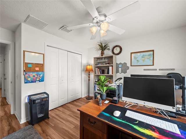 30 N Kaufman Ter, Inverness, FL 34453 - office area featuring ceiling fan, wood finished floors, and visible vents