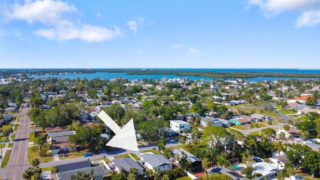 birds eye view of property with a residential view and a water view