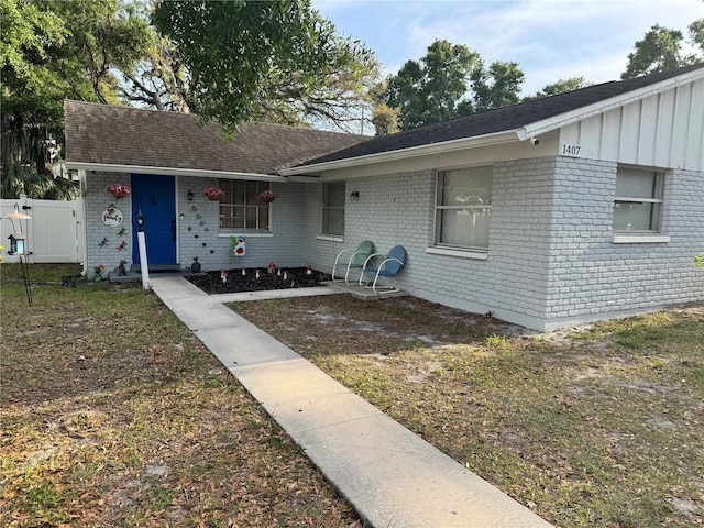 1407 College Park Ln, Tampa, FL 33612 - view of front of home with brick siding