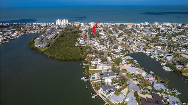 birds eye view of property with a residential view and a water view