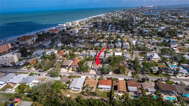 bird's eye view featuring a residential view and a water view