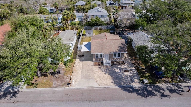birds eye view of property with a residential view