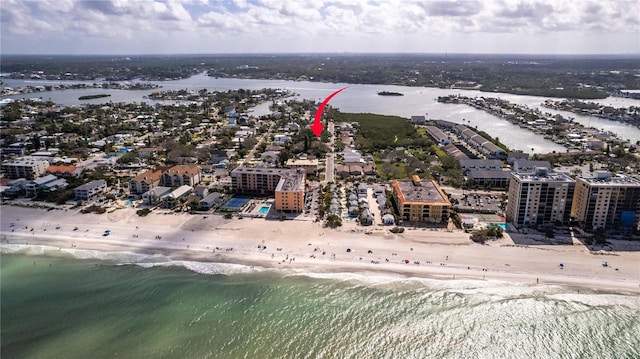 bird's eye view featuring a beach view and a water view