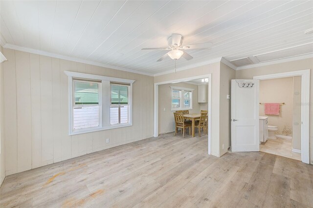 living room featuring light wood-type flooring, a ceiling fan, and ornamental molding