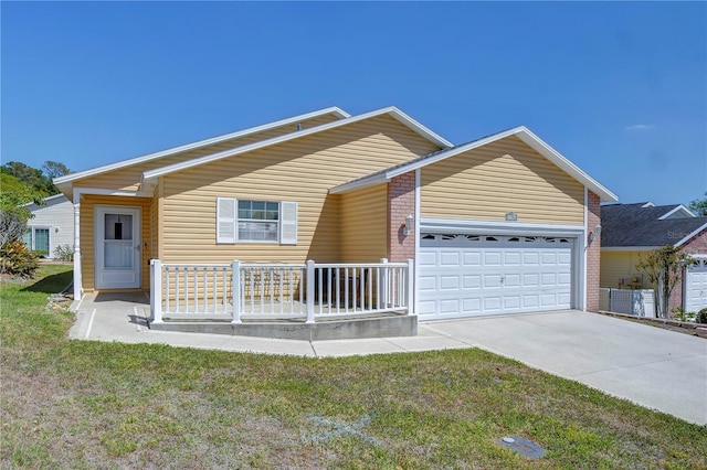 5906 Greenbriar Ct, Zephyrhills, FL 33542 - single story home featuring a garage, a front yard, and concrete driveway