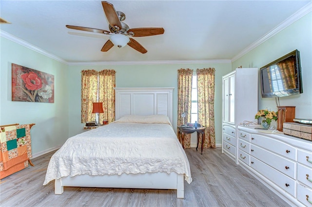 5906 Greenbriar Ct, Zephyrhills, FL 33542 - bedroom with crown molding, baseboards, light wood finished floors, and a ceiling fan
