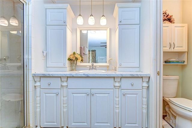5906 Greenbriar Ct, Zephyrhills, FL 33542 - bathroom featuring toilet, a stall shower, and vanity