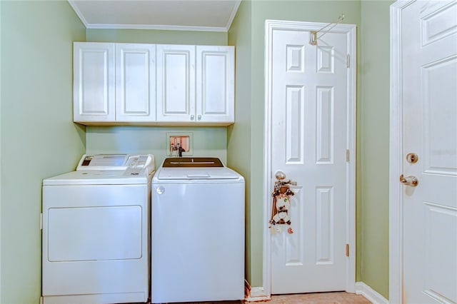 5906 Greenbriar Ct, Zephyrhills, FL 33542 - laundry area with washing machine and dryer, baseboards, ornamental molding, and cabinet space
