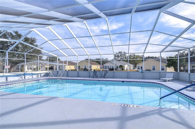 5906 Greenbriar Ct, Zephyrhills, FL 33542 - pool with a patio, a residential view, and a lanai