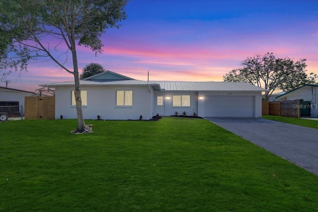 3404 33rd Street Ct W, Bradenton, FL 34205 - single story home with an attached garage, concrete driveway, metal roof, and stucco siding