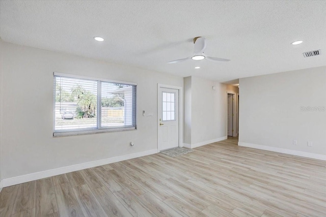 3404 33rd Street Ct W, Bradenton, FL 34205 - unfurnished room with a textured ceiling, light wood-type flooring, ceiling fan, baseboards, and recessed lighting