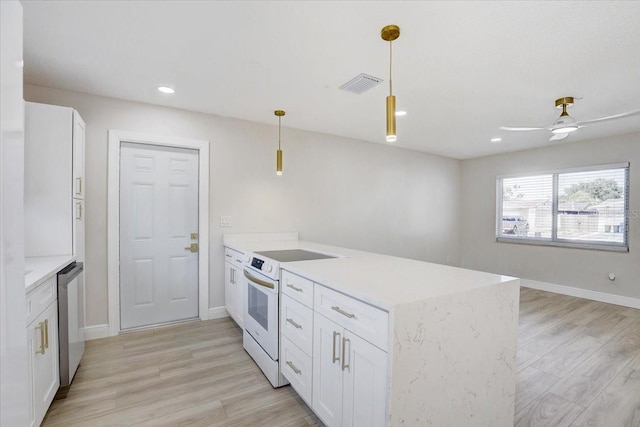 3404 33rd Street Ct W, Bradenton, FL 34205 - kitchen featuring white electric range oven, a peninsula, light wood-type flooring, white cabinetry, and stainless steel dishwasher
