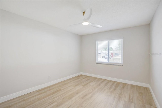 3404 33rd Street Ct W, Bradenton, FL 34205 - spare room featuring light wood-style flooring, baseboards, and ceiling fan