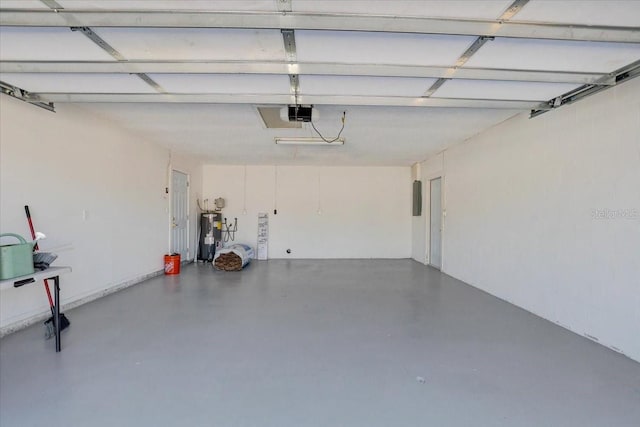 3404 33rd Street Ct W, Bradenton, FL 34205 - garage with electric water heater and a garage door opener