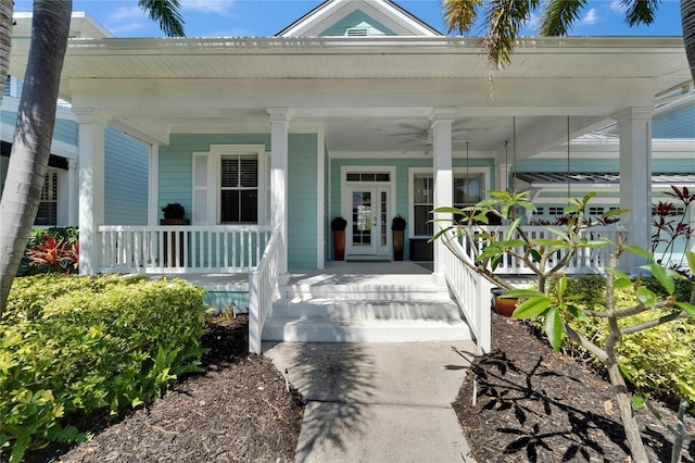 entrance to property featuring french doors and covered porch