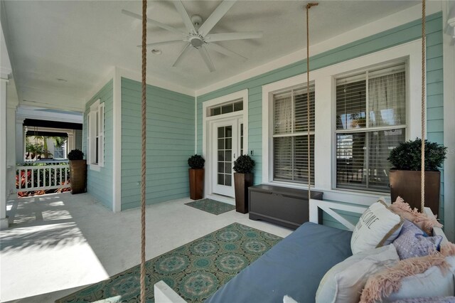 view of patio / terrace with covered porch and ceiling fan