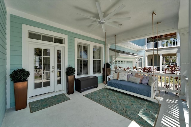 view of patio with french doors, ceiling fan, and an outdoor living space