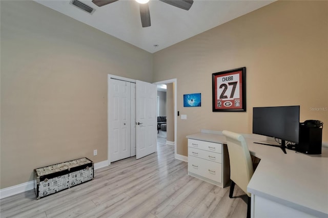 office with light wood-type flooring, ceiling fan, baseboards, and visible vents
