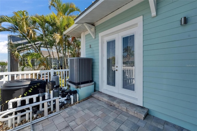 exterior space featuring french doors and central AC