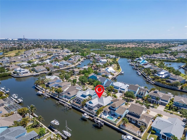 aerial view featuring a water view and a residential view