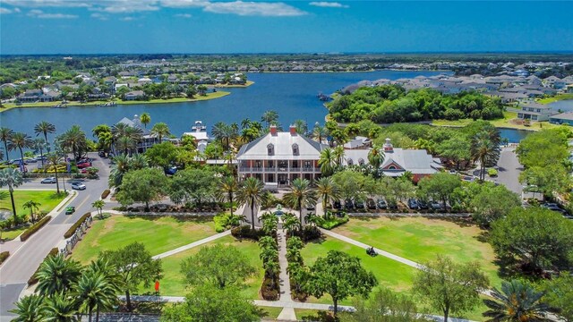bird's eye view featuring a residential view and a water view
