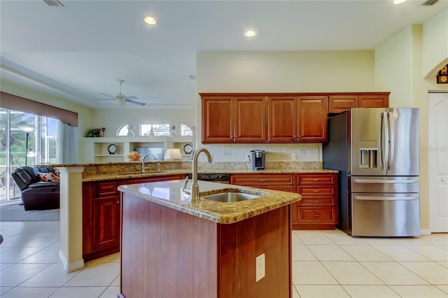 522 Planters Manor Way, Bradenton, FL 34212 - kitchen featuring stainless steel refrigerator with ice dispenser, light tile patterned floors, light stone countertops, a peninsula, and recessed lighting