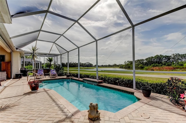 522 Planters Manor Way, Bradenton, FL 34212 - swimming pool featuring a patio, a water view, and glass enclosure