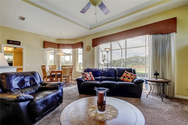 522 Planters Manor Way, Bradenton, FL 34212 - carpeted living room with plenty of natural light, a ceiling fan, and ornamental molding