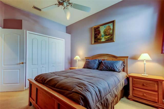 522 Planters Manor Way, Bradenton, FL 34212 - bedroom featuring light colored carpet, a closet, and ceiling fan