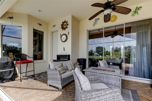 522 Planters Manor Way, Bradenton, FL 34212 - view of patio featuring ceiling fan and an outdoor living space with a fire pit