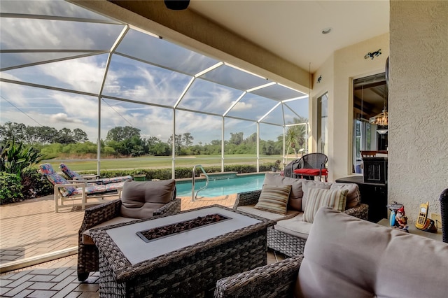 522 Planters Manor Way, Bradenton, FL 34212 - view of patio / terrace featuring an outdoor living space with a fire pit, an outdoor pool, and glass enclosure