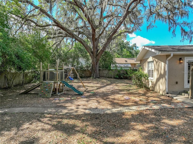 view of play area with fence